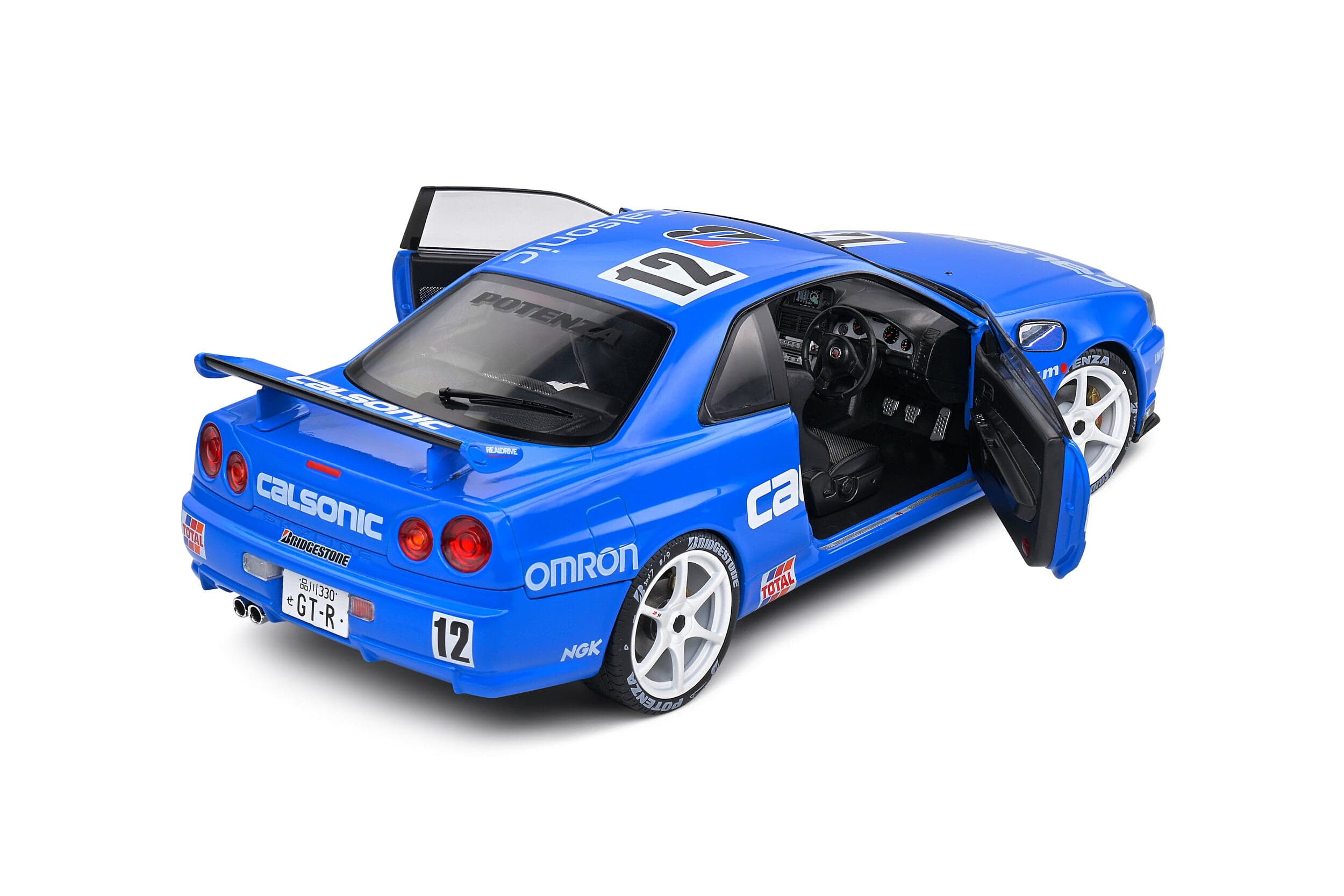 Macheta auto Nissan GT-R (R34) Streetfighter Calsonic Tribute  (2000) 1:18 Solido - 5