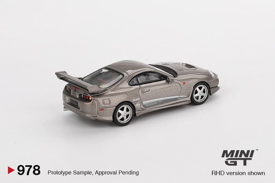 Macheta auto Toyota Supra MK4 (A80) VeilSide Combat V-II Combat Grey 2011 (LHD) 1:64 MIniGT - 2
