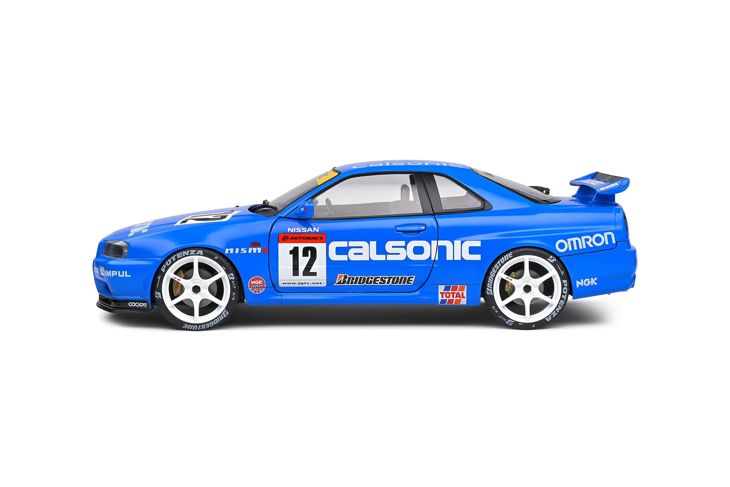 Macheta auto Nissan GT-R (R34) Streetfighter Calsonic Tribute  (2000) 1:18 Solido - 2